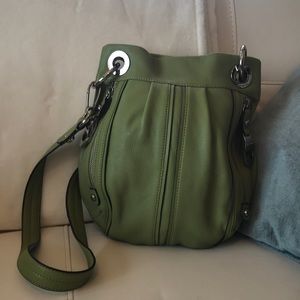 B. Makowsky green cross body purse